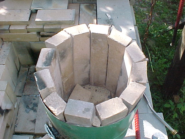 firebrick cut at angle and laid into freon tank as refractory.jpg